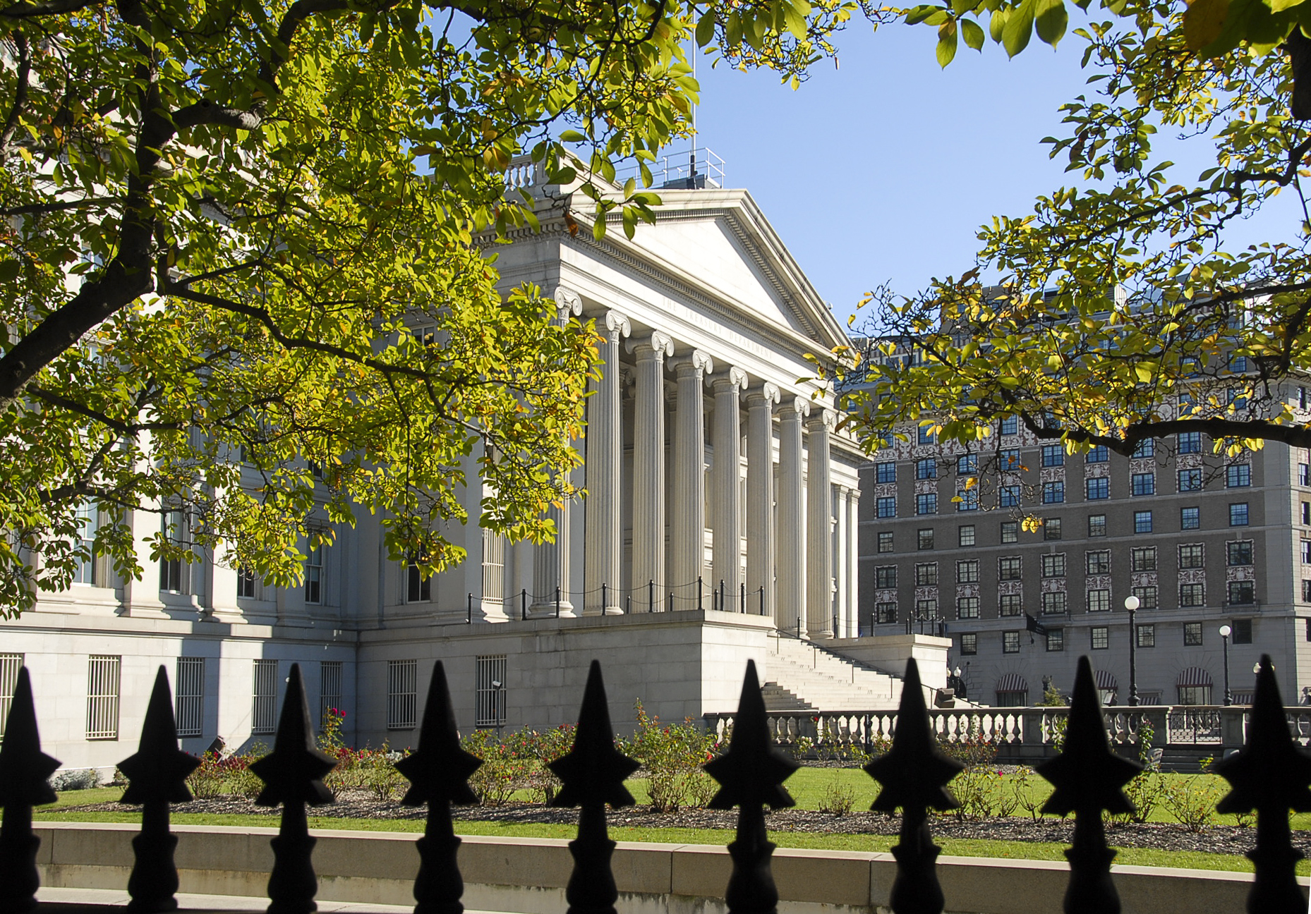 treasury building with fence and trees